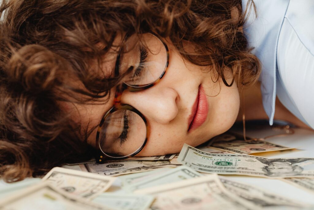 Women sleeps on money.
